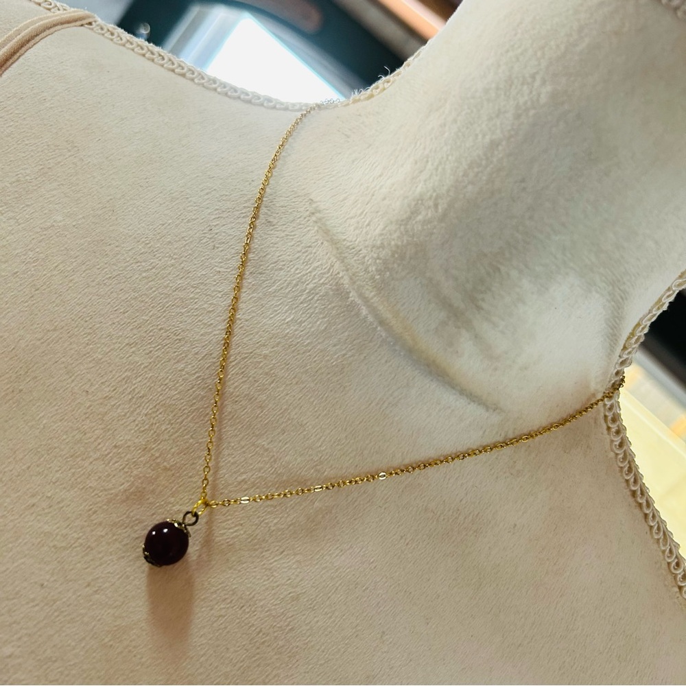 Handcrafted vintage bead capped burgundy glass pendant on chain necklace